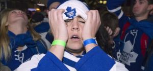 Fans react in disbelief to the Leafs Game 7 third period collapse in Boston. The Bruins roared back from a 3-goal deficit to win 5-4 in overtime to eliminate the Leafs.